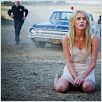 Encerrada : photo Amber Heard, John Carpenter