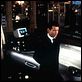 El mundo nunca es suficiente : photo John Cleese, Michael Apted, Pierce Brosnan