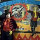 Across the Universe : photo Eddie Izzard, Julie Taymor